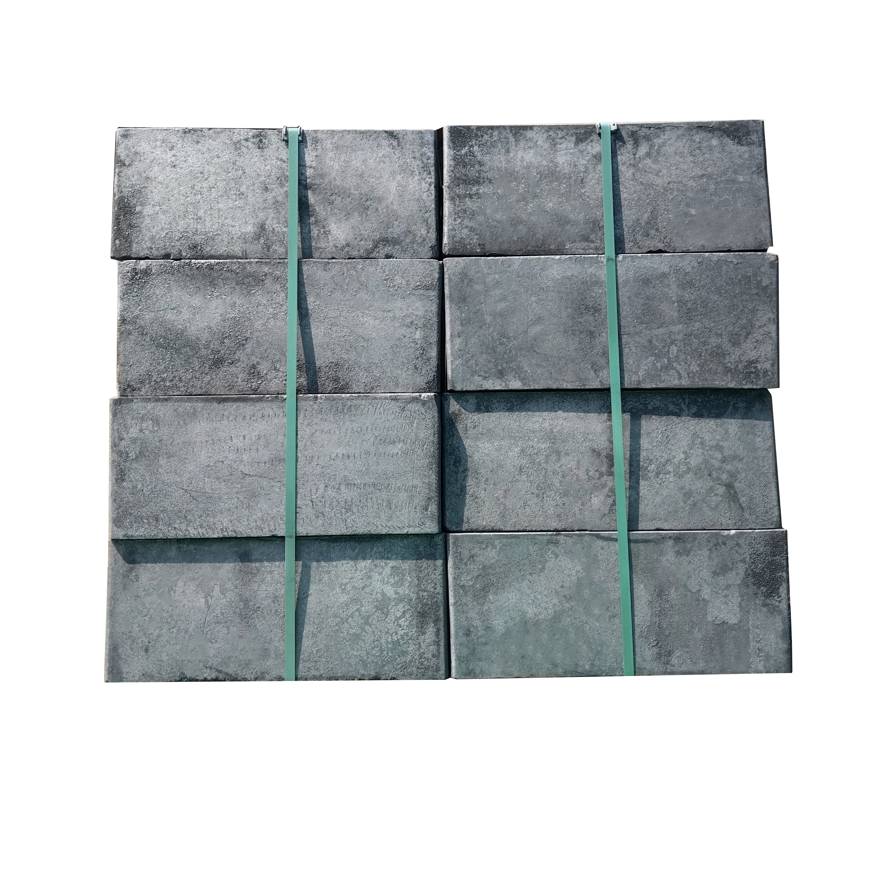 Medium grain graphite blocks secured with green strapping bands for export shipment, vibration molded blocks packaged on fumigated wooden pallets for international delivery