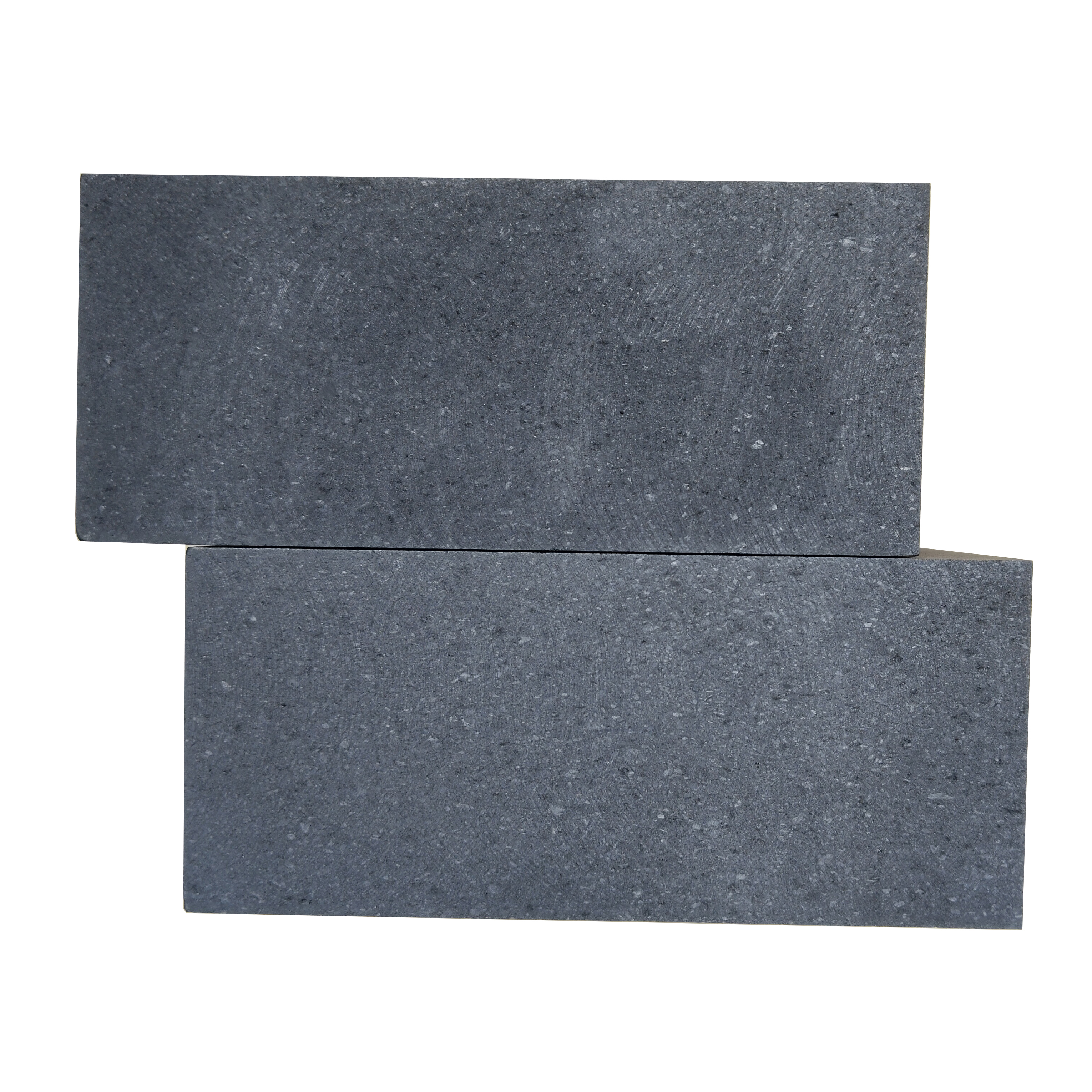 Closeup of medium grain graphite block surface showing natural 0.8mm particle texture and uniform vibration molded structure, density 1.72g/cm&sup3; for casting mold applications