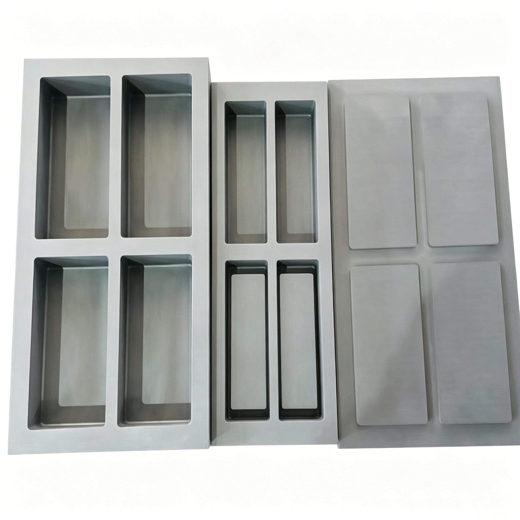 Two 4 cavity graphite ingot molds with different slot sizes and matching cover plate