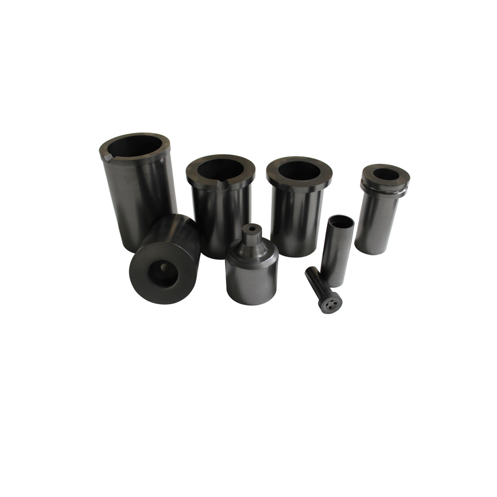 Collection of 8 graphite crucibles including single ring standard and special shaped custom designs for diverse industrial applications