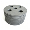 Bulk graphite disc stack with five-hole pattern and center bore, side view showing batch production quantity, Ningheda high-volume carbon sintering trays for industrial furnace operations