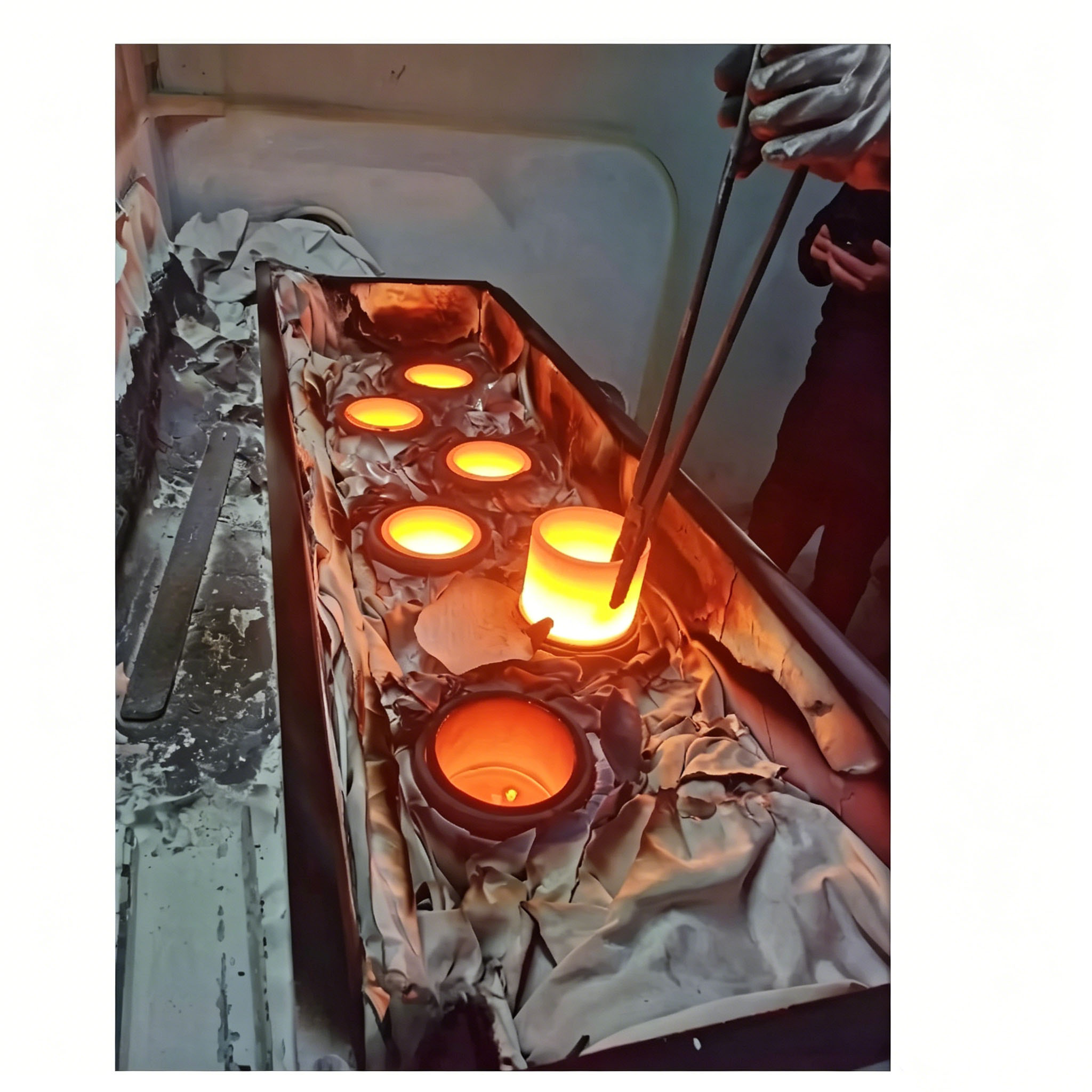 Industrial graphite crucibles in a vacuum evaporation coating production line, designed for continuous aluminum melting and thin film deposition