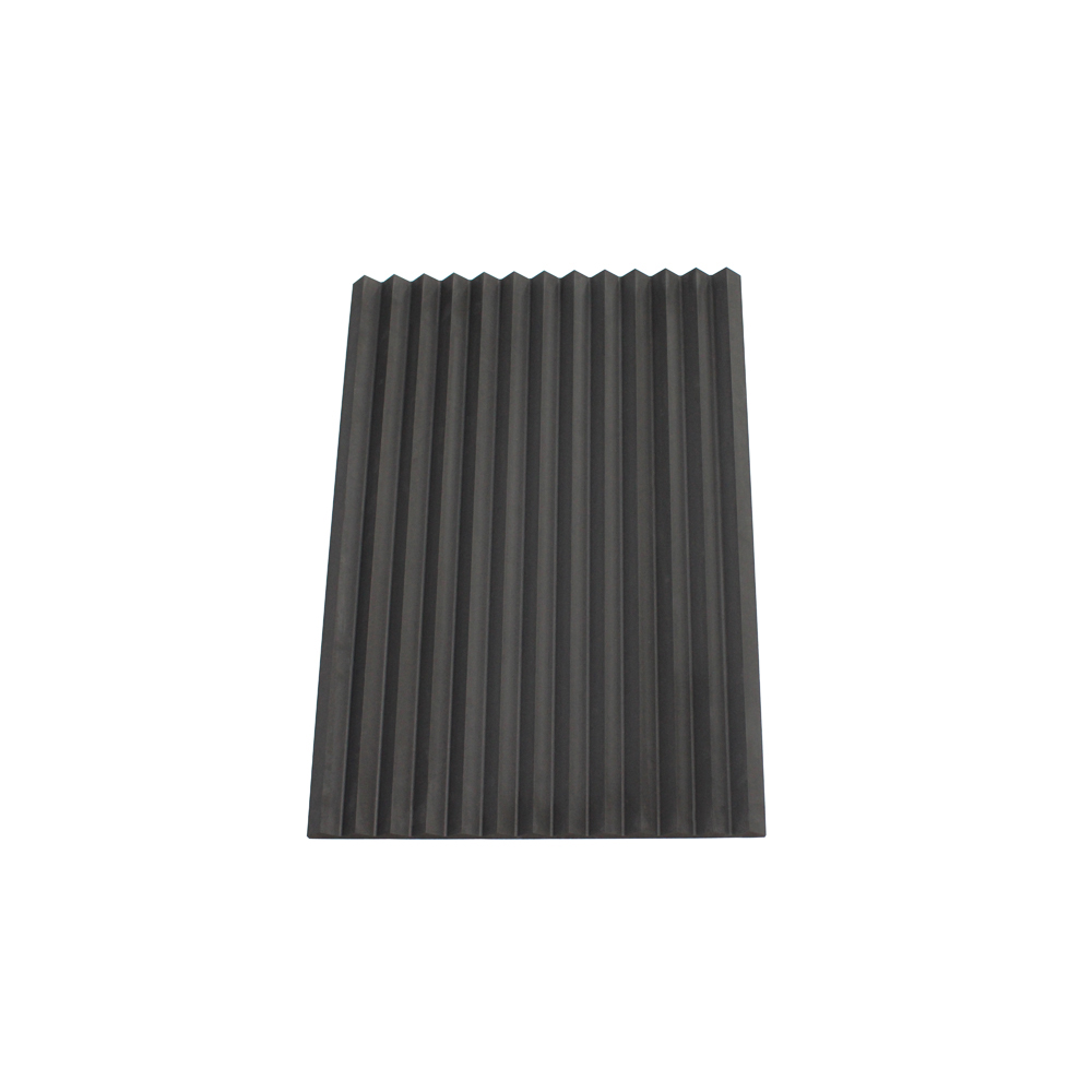 Front view of dark gray V-groove graphite plate with sharp angled CNC machined channels for CVD gas distribution