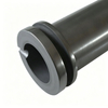 Close-up view of double ring graphite crucible top showing retention ring groove and precision machined pouring spout for safe metal transfer
