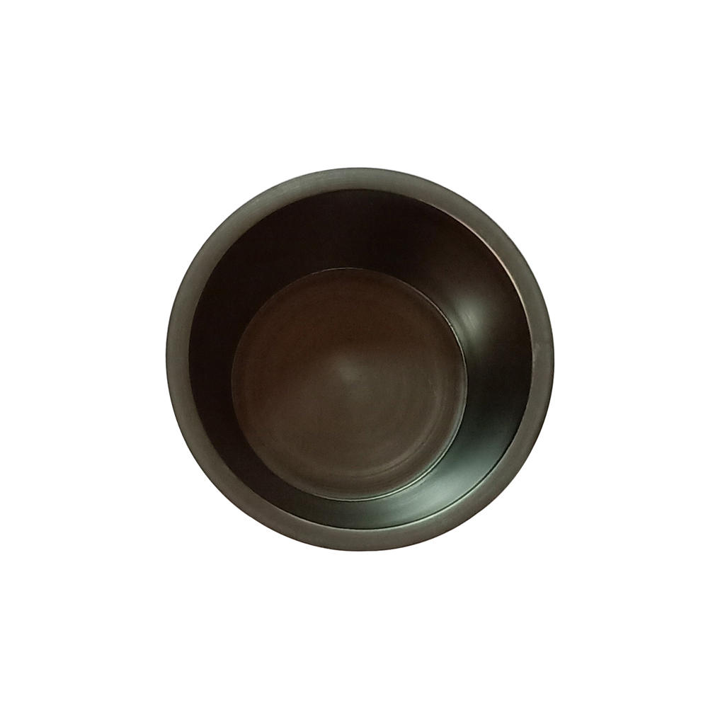 Close-up view of polished inner wall of flat graphite crucible for non-stick melting