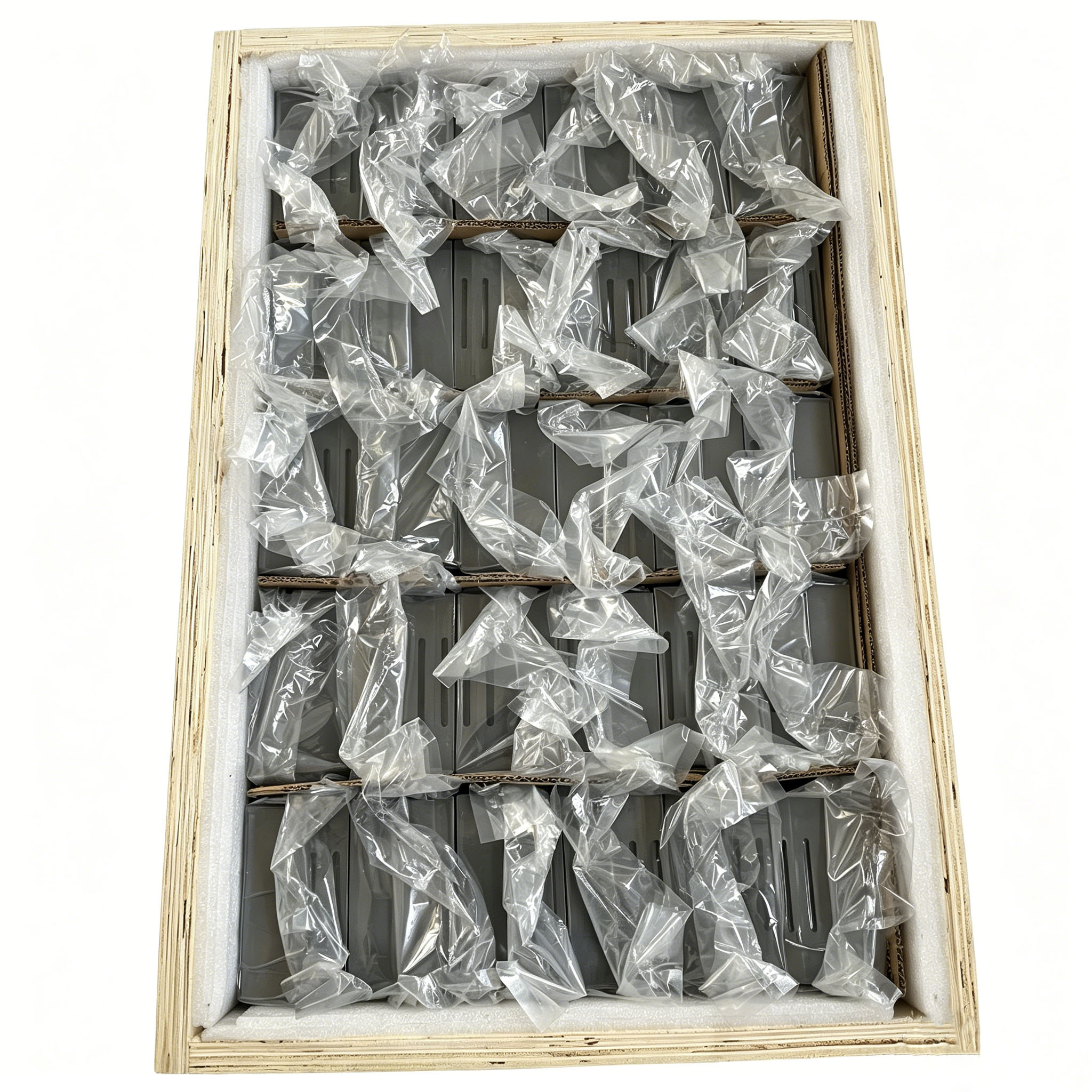Internal view showing individual plastic wrapping and custom foam inserts inside the box to prevent breakage of single ring graphite crucibles during transit