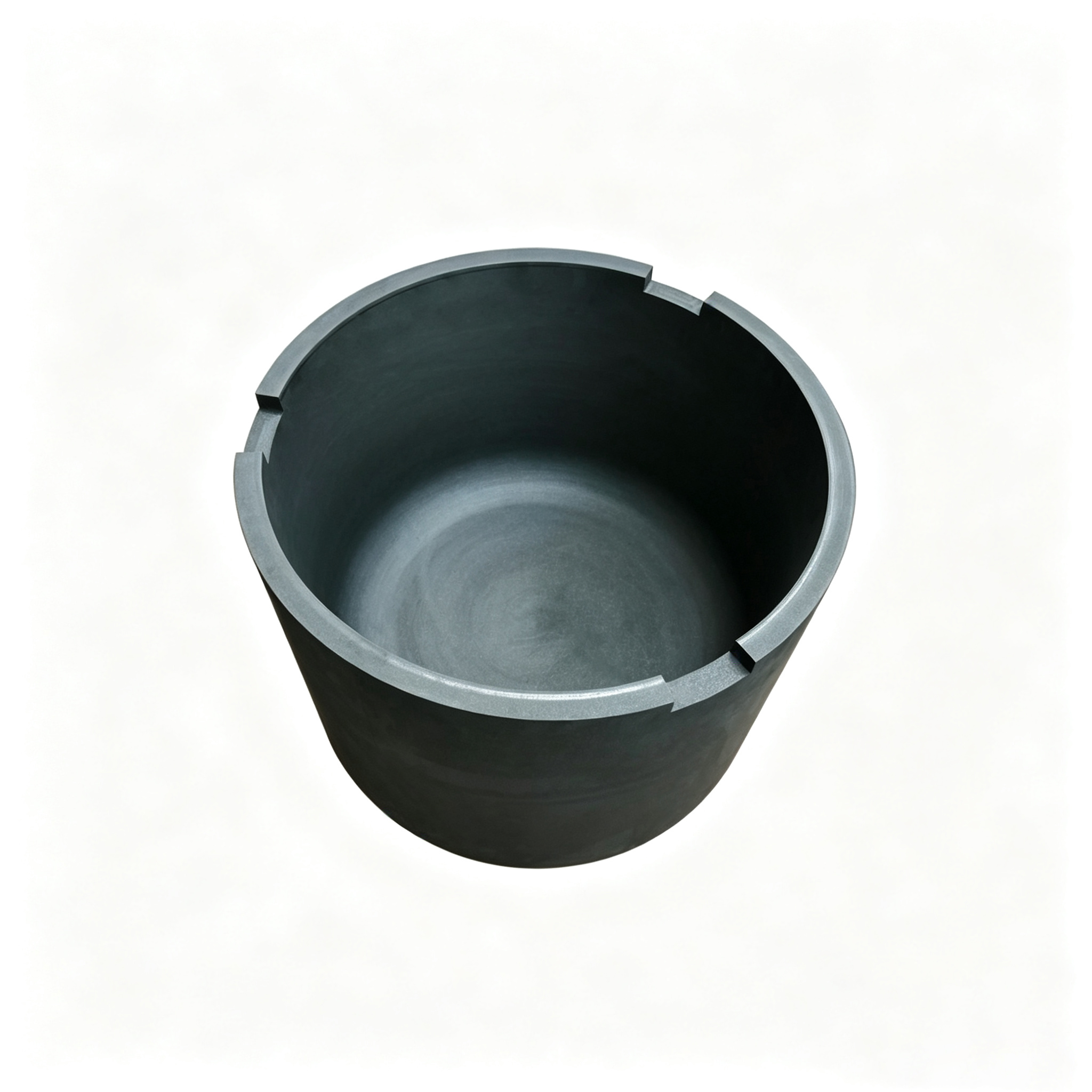 Graphite crucible with notched rim top view, four symmetric slots on top edge for tong grip and positioning, industrial melting container for foundry operations, NHD Carbon custom machined design