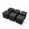 Six medium grain vibration molded graphite cubes displayed on white background, showing natural coarse particle texture and uniform block shape, 0.8mm-2.0mm grain size available