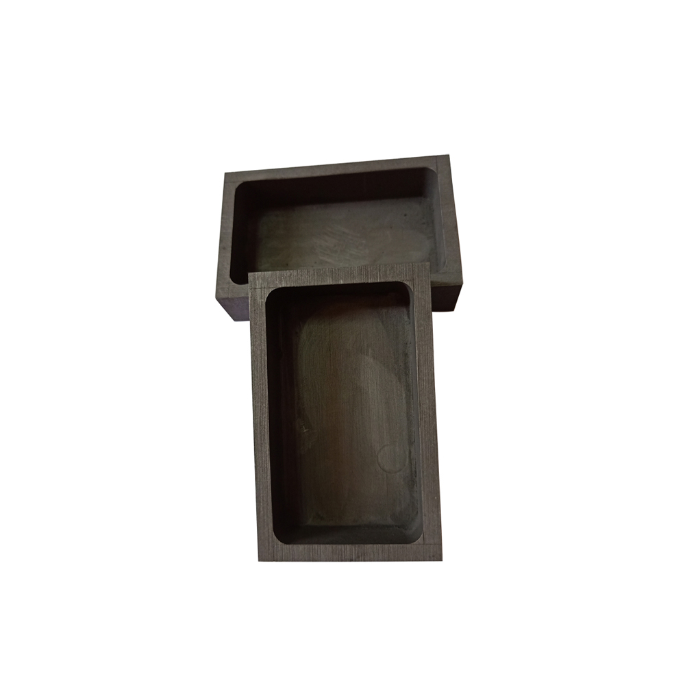 Two stacked rectangular graphite sintering boxes, ideal for batch processing of materials in high-temperature furnaces