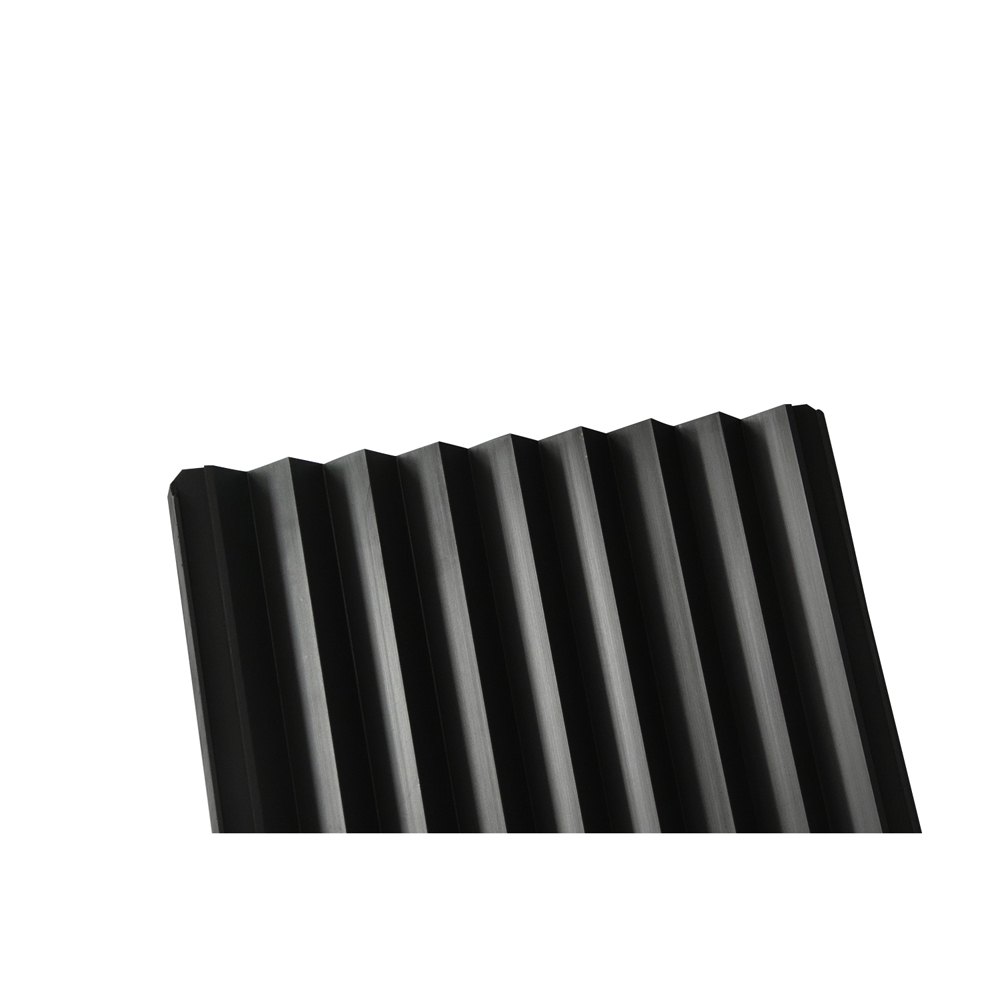 Edge detail of grooved graphite plate showing glossy CNC machined groove profile with sharp clean edges