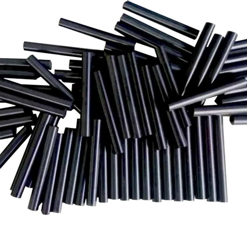 Bulk graphite rod short pieces stacked display, batch cut carbon bar blank supply, high-purity graphite round bar cut processing, length 50-200mm optional, suitable for laboratory electrodes and small heating elements