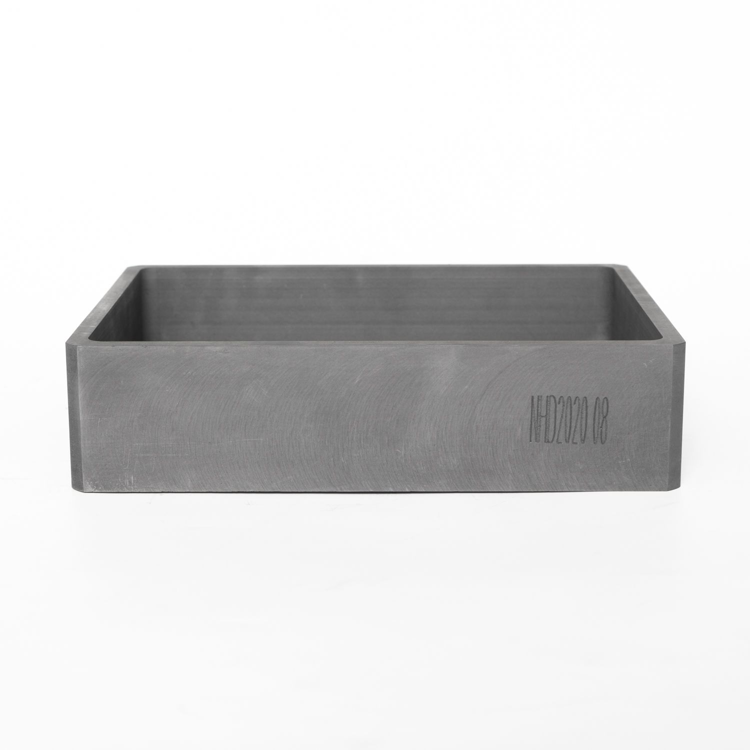 Rectangular graphite box with engraved ID, designed for industrial high-temperature applications requiring material traceability